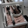 Flat top chain conveyor as a bi-flow table