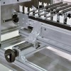 Chain conveyor with attachments and width adjustment