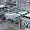 A lift gate conveyor as part of a pallet-handling conveyor system