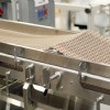 Conveyor with belt lifter